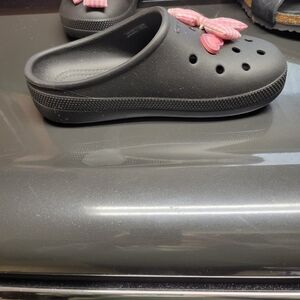 CROCS Black Clogs with Pink Bow